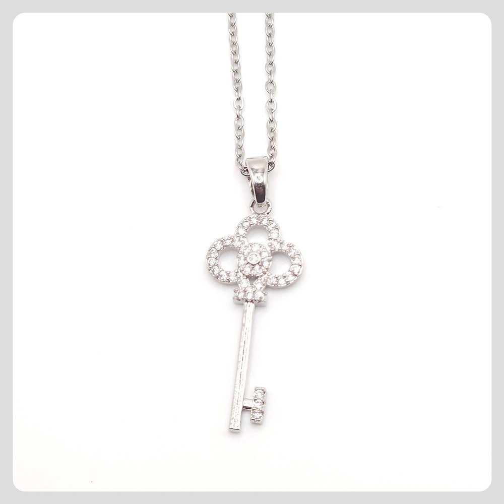 Gold Tone CZ Key Pendant Necklace